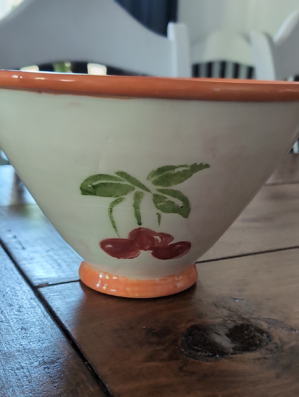 Cream Ceramic Bowl with Red Cherry Motif and Orange Trim